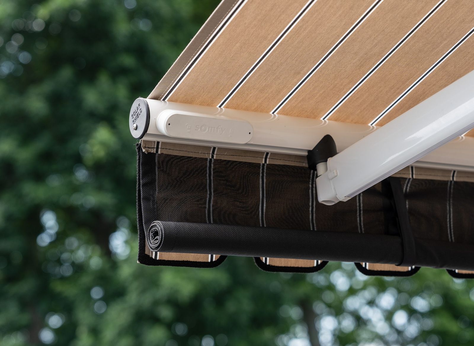 Somfy motor and headrail on a Manchester Awning retractable awning install